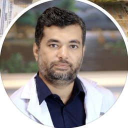 Portrait of Dr. K. M. Nahid Ul Haque in a white coat.